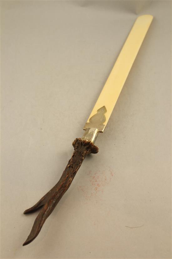 A Victorian ivory and horn handled silver mounted page turner, 21in.